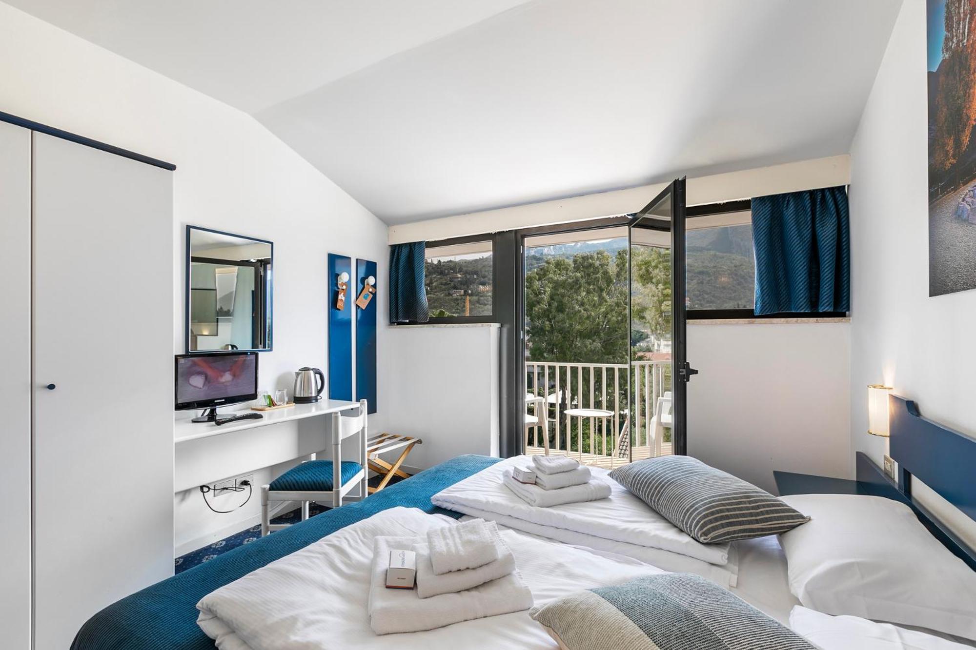 Bike & Wind Hotel Villa Maria Torbole Sul Garda Exterior photo